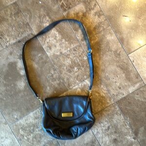 Michael Kors leather, grey taupe purse with gold hardware.  Excellent bag.